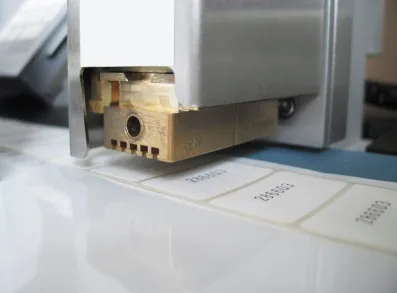 Hot foil coder print head marking labels